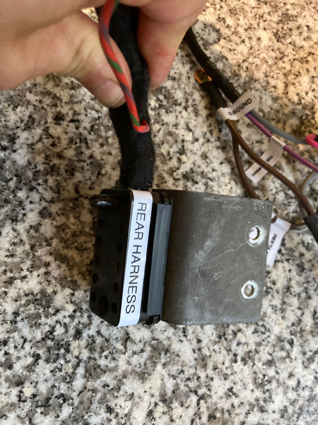 Rear harness interconnection terminal