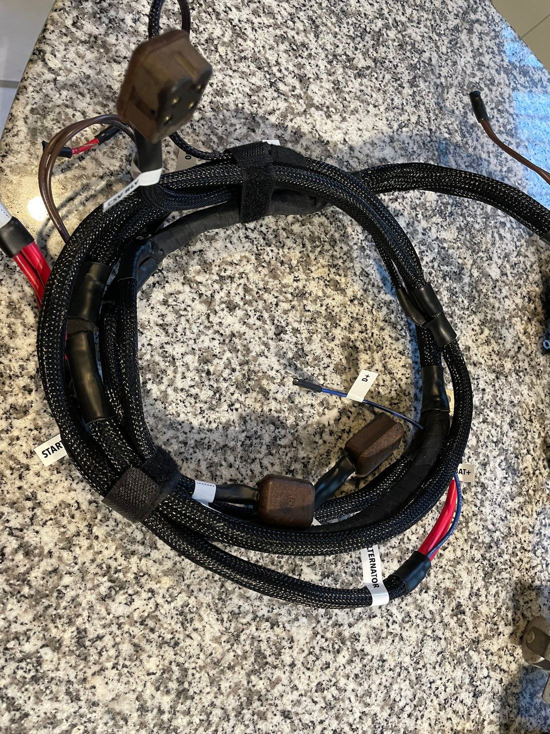 Passenger side branch servicing ALTERNATOR, STARTER